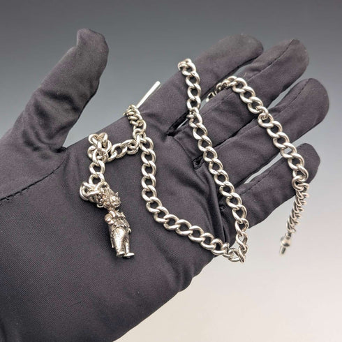 Circa 1900 British antique sterling silver long Albert chain 48g clown charm fob