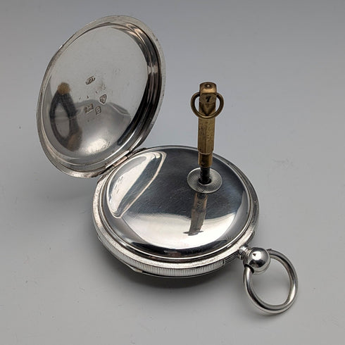 1881 British antique John Cowgill sterling silver pocket watch with key winding mechanism, 53mm diameter, in good working order
