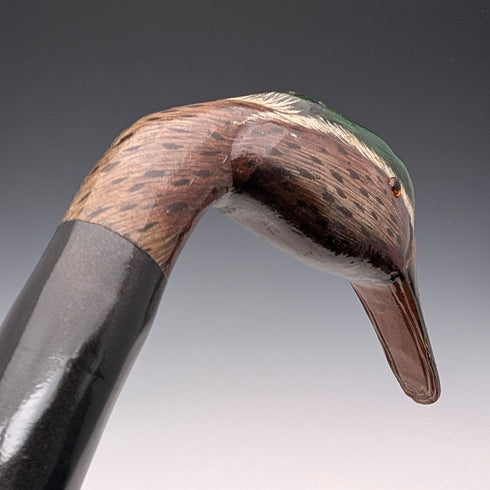 British vintage twisted black shaft walking stick with painted duckhead handle, 94cm