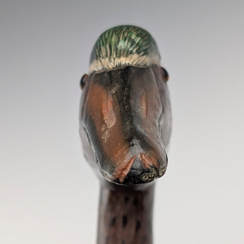 British vintage twisted black shaft walking stick with painted duckhead handle, 94cm