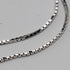 Vintage sterling silver floral pendant with stones, with sterling silver necklace, total 2g.