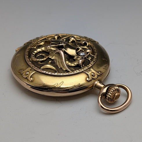 Zenith pocket watch, circa 1913, with dragon relief carving, 18k gold hunter case, in good working order.