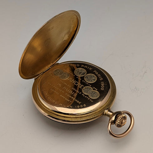 Zenith pocket watch, circa 1913, with dragon relief carving, 18k gold hunter case, in good working order.