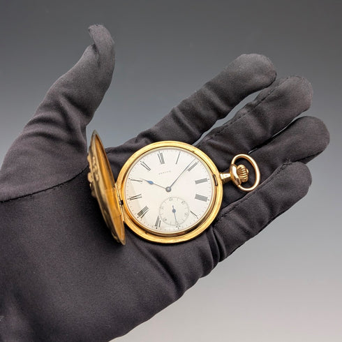 Zenith pocket watch, circa 1913, with dragon relief carving, 18k gold hunter case, in good working order.