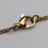 Vintage rolled gold cross pendant with necklace chain