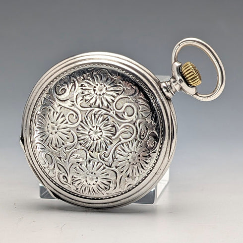 Antique Longines pocket watch, circa 1912, floral decoration, silver-sided hunter case, in good working order.