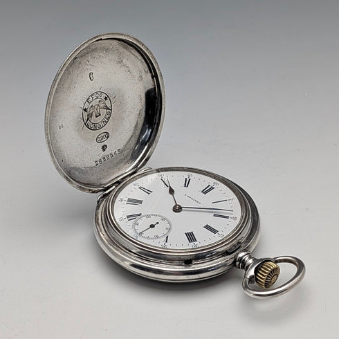 Antique Longines pocket watch, circa 1912, floral decoration, silver-sided hunter case, in good working order.