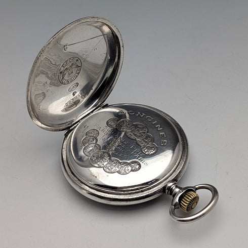 Antique Longines pocket watch, circa 1912, floral decoration, silver-sided hunter case, in good working order.