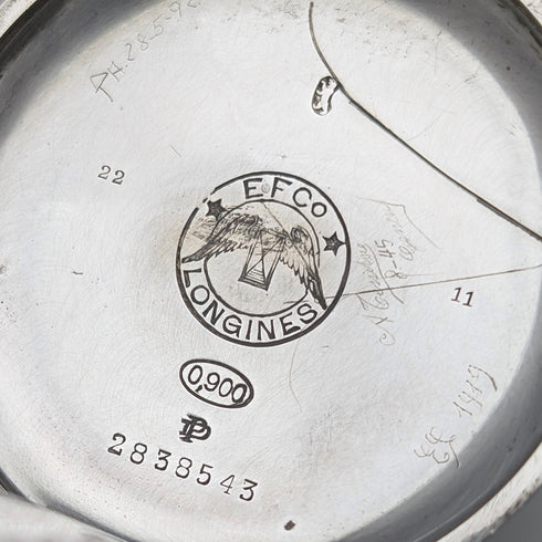 Antique Longines pocket watch, circa 1912, floral decoration, silver-sided hunter case, in good working order.