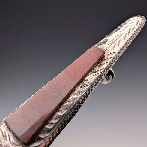 Antique British sterling silver brooch with three colored stones and a Scottish dark finish.