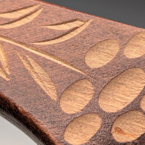 Vintage brown shaft walking stick with carved wood accents and an axe-shaped handle, 85cm