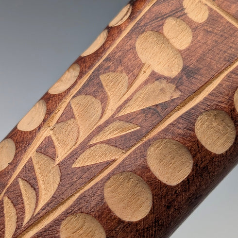 Vintage brown shaft walking stick with carved wood accents and an axe-shaped handle, 85cm