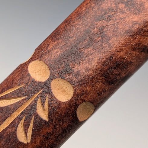 Vintage brown shaft walking stick with carved wood accents and an axe-shaped handle, 85cm