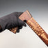 Vintage brown shaft walking stick with carved wood accents and an axe-shaped handle, 85cm