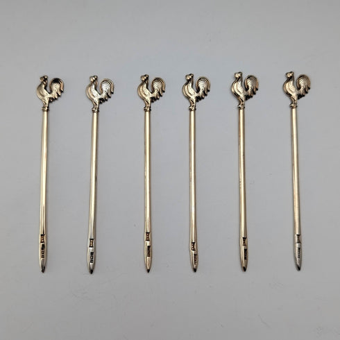 1958年英國沃克霍爾(Walker & Hall)出品的純銀雞尾酒簽套裝,共6支,總重19克,附原廠盒