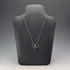 British vintage sterling silver ribbon design pendant with sterling silver chain.