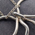 British vintage sterling silver ribbon design pendant with sterling silver chain.