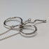 British vintage sterling silver ribbon design pendant with sterling silver chain.