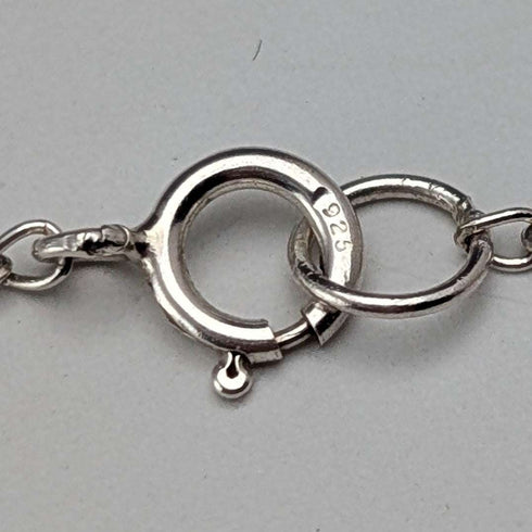 British vintage sterling silver ribbon design pendant with sterling silver chain.