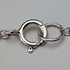 British vintage sterling silver ribbon design pendant with sterling silver chain.