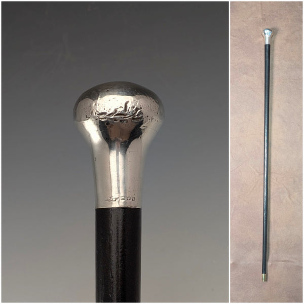 British antique black shaft sterling silver plain rondelle handle walking stick, 87cm
