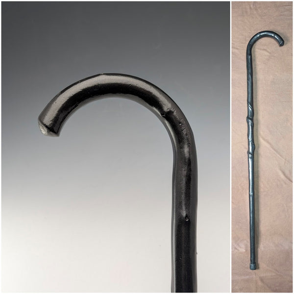 Early 20th century twisted black shaft, curved handle walking stick, 90cm