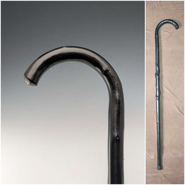 Early 20th century twisted black shaft, curved handle walking stick, 90cm