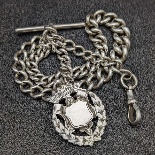Cadena Albert de plata de ley (925) antigua inglesa, c. 1900, 56 g, con dije emblema de plata de ley