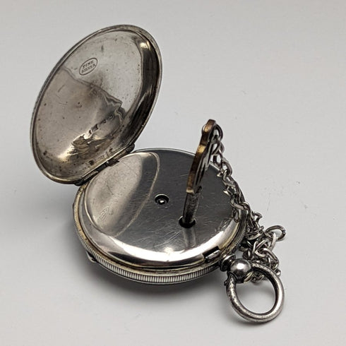 Antique Swiss made ladies' pocket watch works well floral engraving silver side case key winding