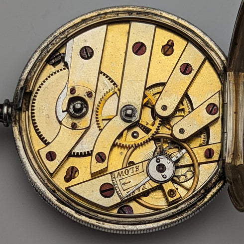 Antique Swiss made ladies' pocket watch works well floral engraving silver side case key winding