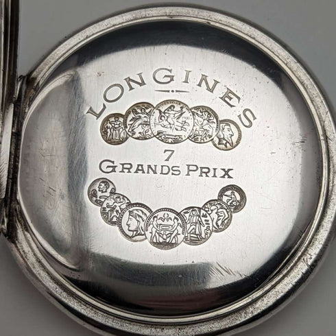 Reloj de bolsillo Longines antiguo de la década de 1920, caja de plata tipo saboneta, en buen estado de funcionamiento.