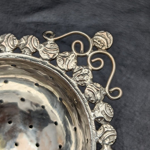 Vintage silver-plated tea strainer