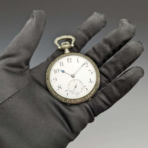 Reloj de bolsillo suizo antiguo, sin marca, con caja grabada de toro, en buen estado de funcionamiento