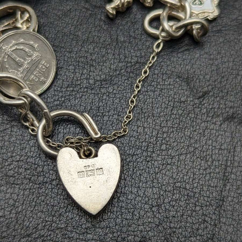 British vintage sterling silver charm bracelet 73g