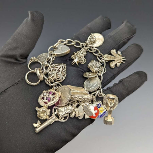 British vintage sterling silver charm bracelet 73g