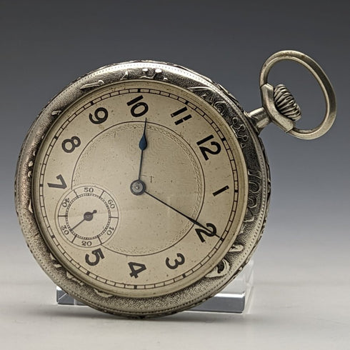 Reloj de bolsillo antiguo sin marca, grabado floral Art Nouveau, caja de aleación, en buen estado de funcionamiento