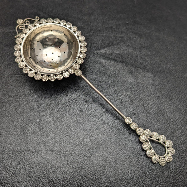 Vintage silver-plated tea strainer