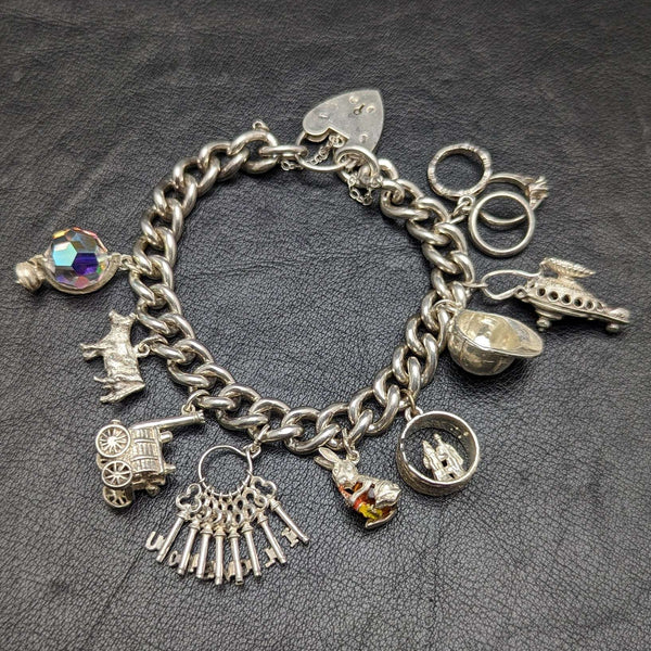 British vintage sterling silver charm bracelet 71g