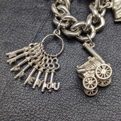 British vintage sterling silver charm bracelet 71g