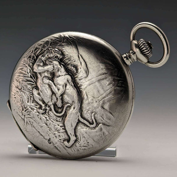 Around 1910 Antique Ulysse Nardin pocket watch Wild beast engraving Silver hunter case Works well