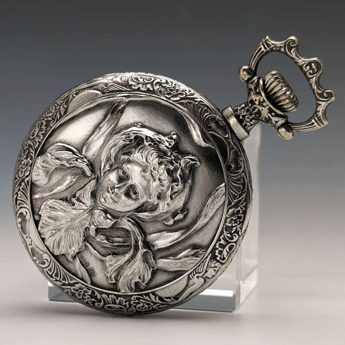 Antique Swiss made unsigned pocket watch with embossed silver plate case works well