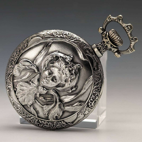 Antique Swiss made unsigned pocket watch with embossed silver plate case works well