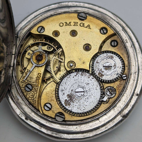 Around 1910 Antique Omega pocket watch Flower engraving Silver side hunter case Works well